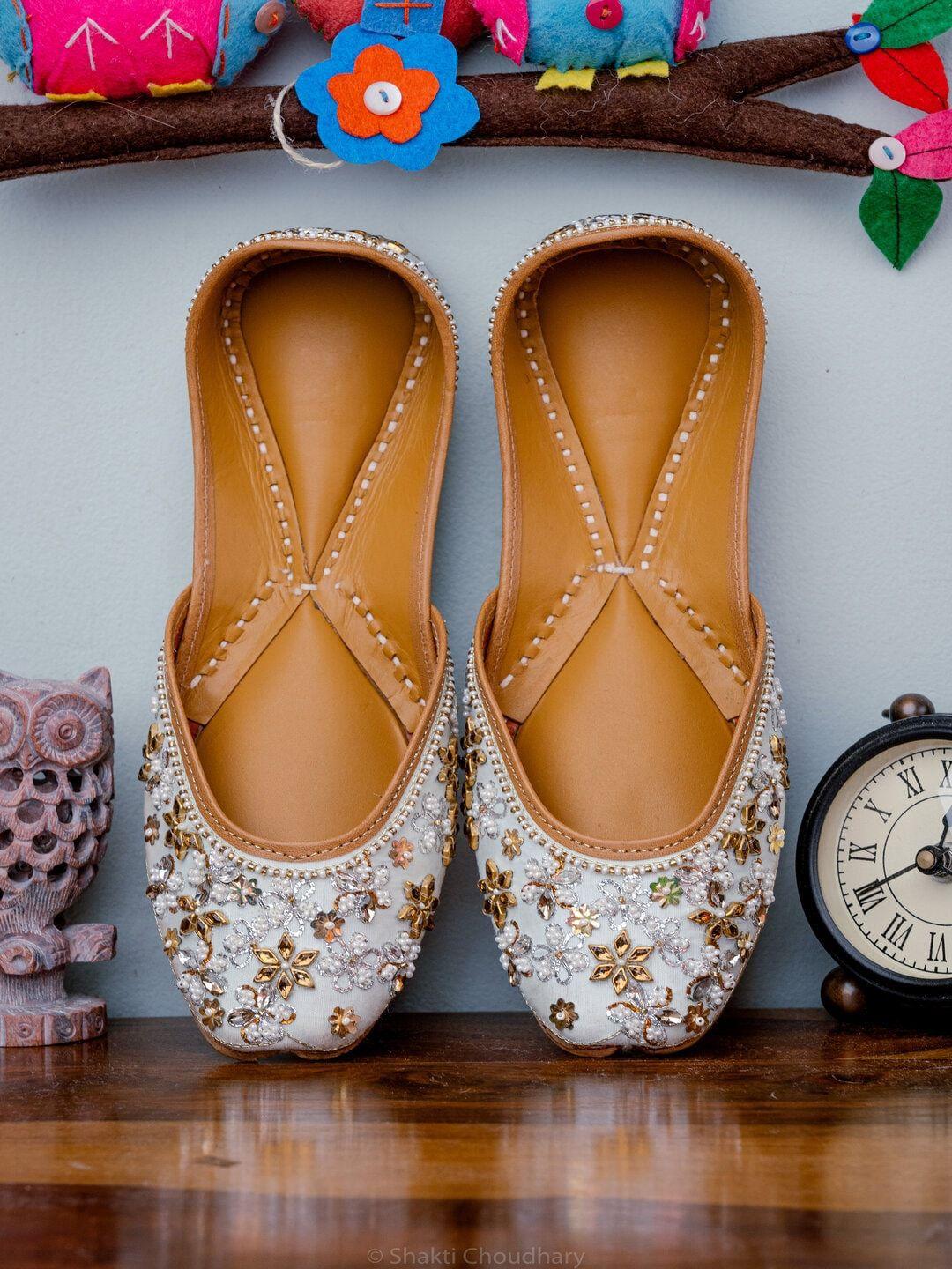 nr by nidhi rathi women off white embellished mojaris flats