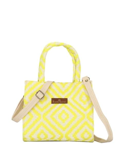 nr by nidhi rathi yellow textured medium handbag