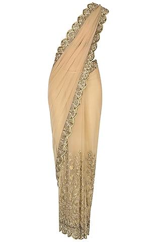 nude hand embroidered saree with emebellished scallop border