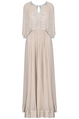 nude off shoulder gown with embroidered cape