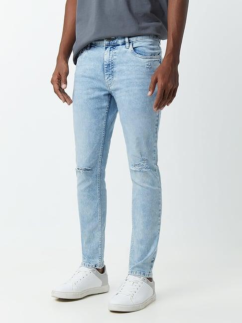 nuon by westside light blue ripped detail rodeo crop carrot-fit jeans