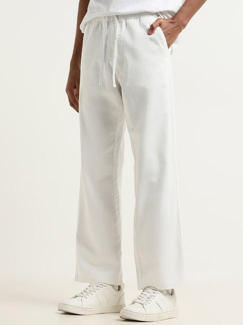 nuon by westside white relaxed fit solid mid rise pants