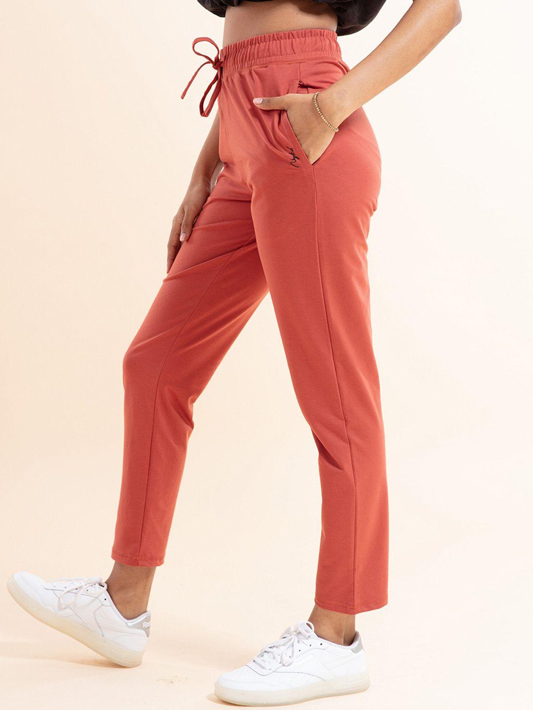 nykd women red solid track pants