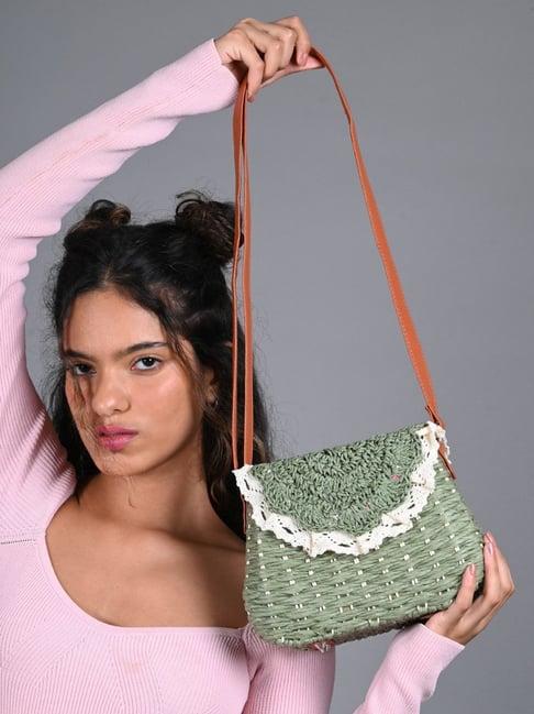 odette green woven sling handbag