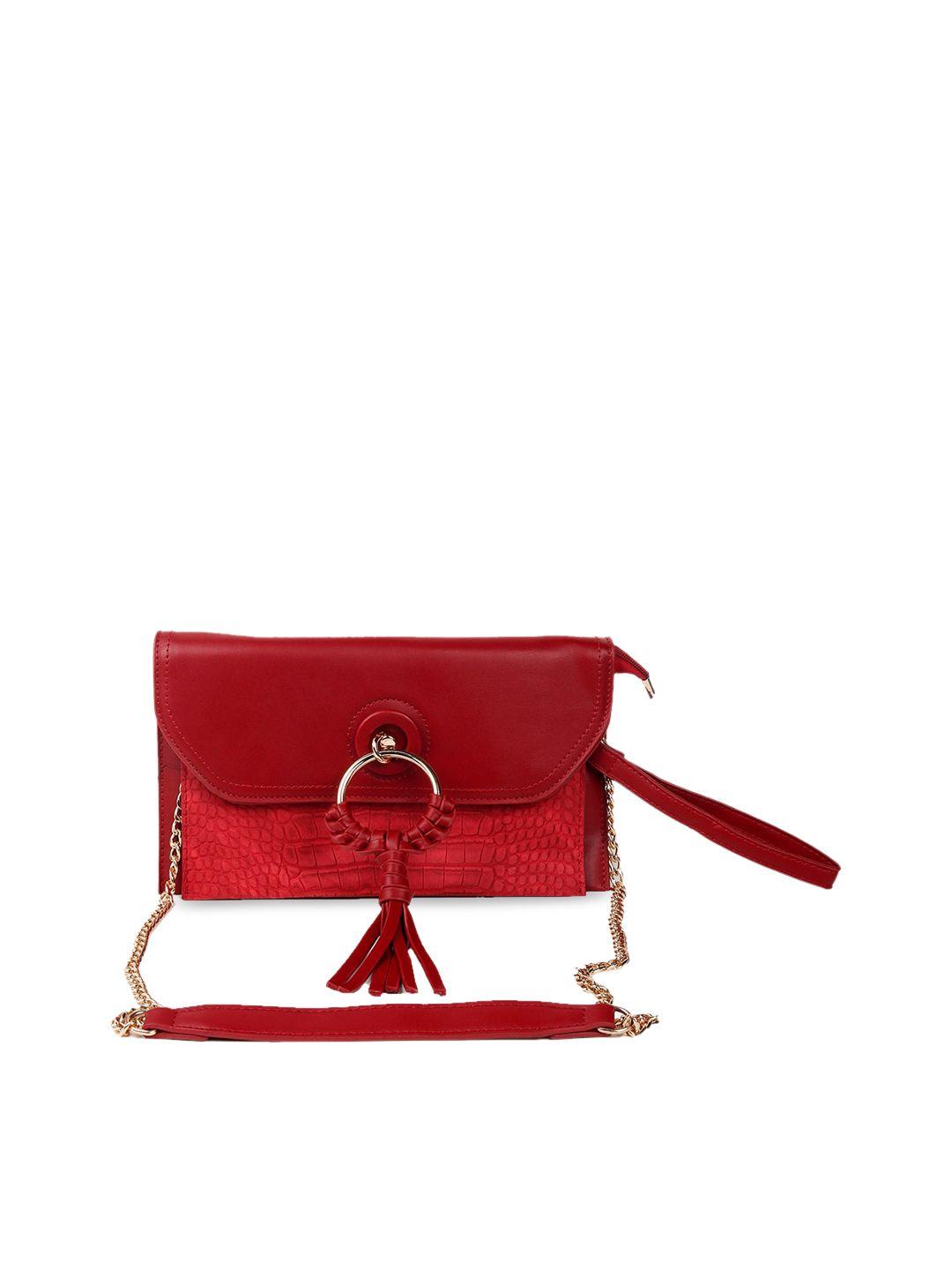 odette red textured structured sling bag with tasselled