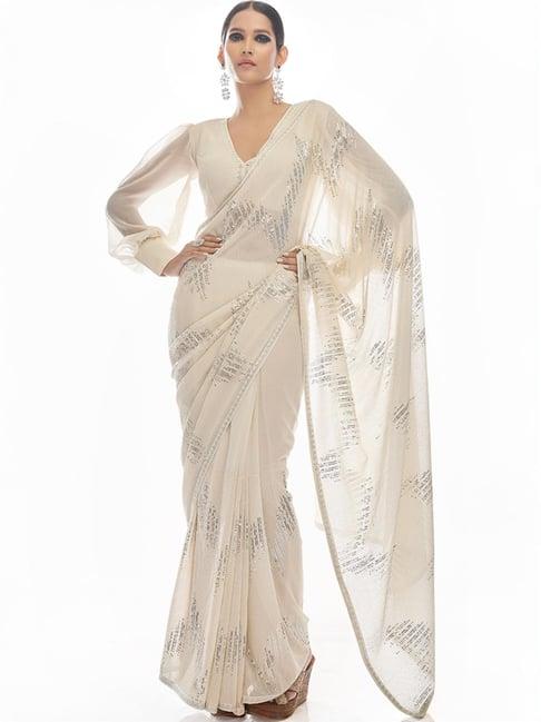 odette white embellished saree with unstitched blouse