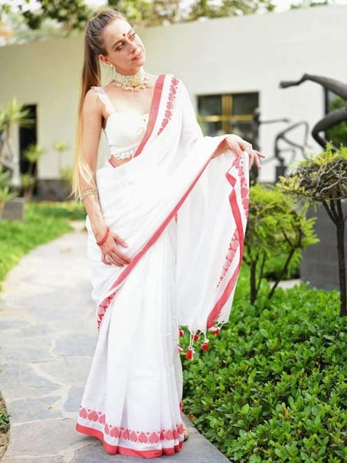 odette white woven saree with unstitched blouse