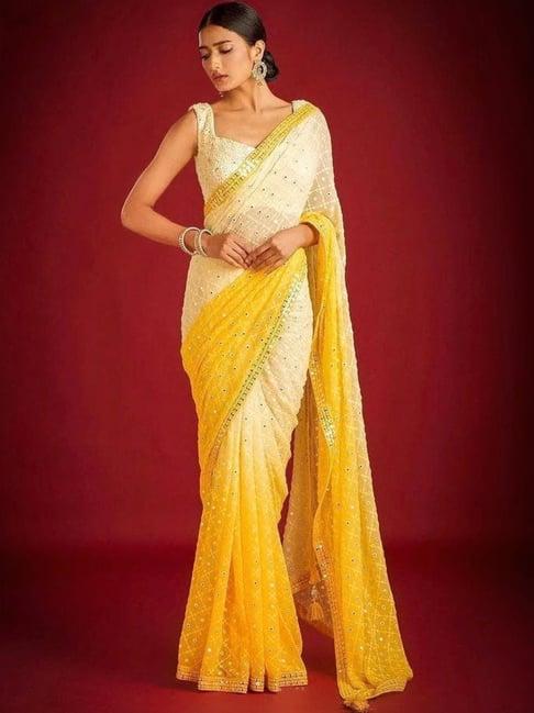 odette yellow embroidered saree with unstitched blouse