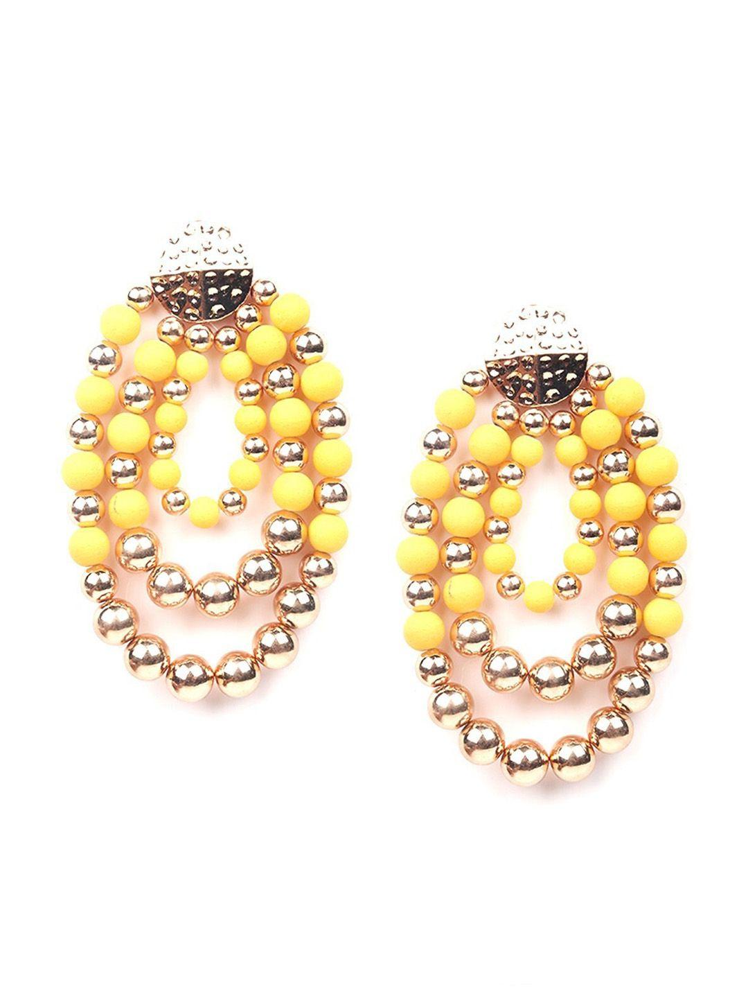 odette yellow oval studs earrings