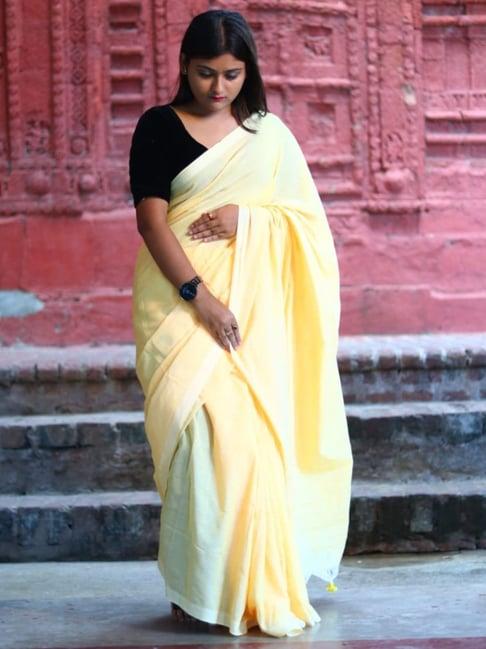 odette yellow plain saree with unstitched blouse