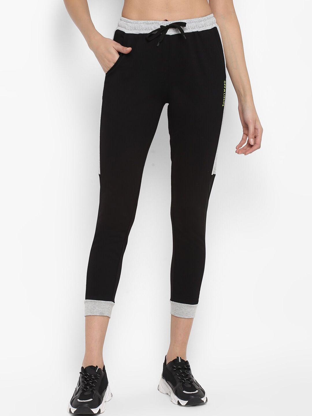 off limits women black solid cropped track pants