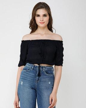 off-shoulder crop top with tassels