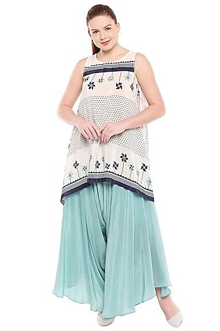 off white printed top with teal blue palazzo pants