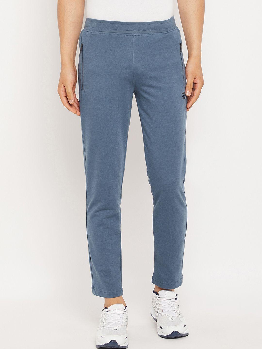 okane men blue solid track pants