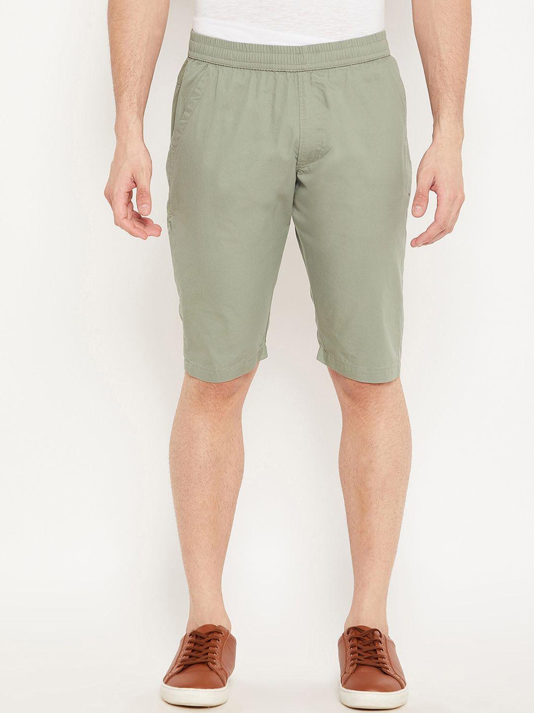okane men green solid shorts