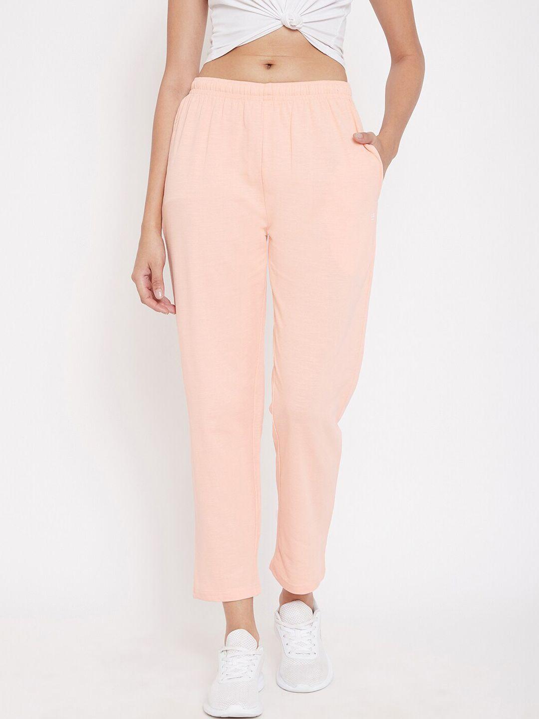 okane women peach-coloured solid comfort-fit track pants