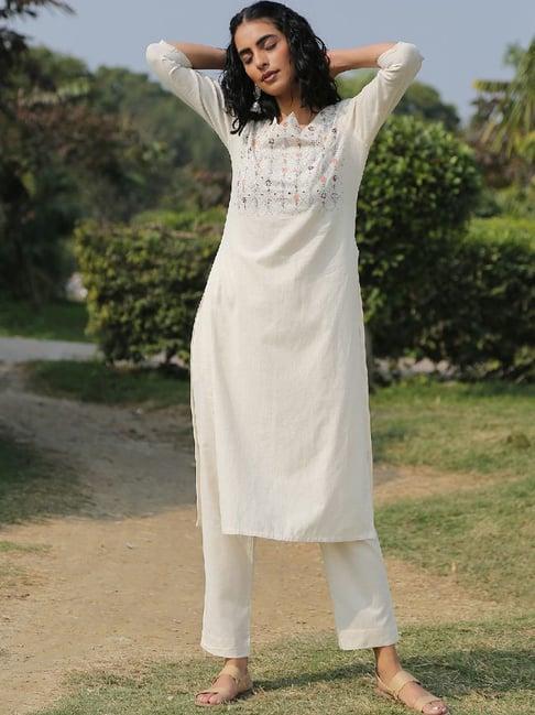 okhai flourish off-white hand embroidered kurta pant set