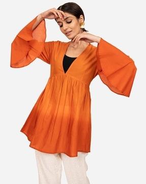 ombre-dyed peplum top with bell sleeves