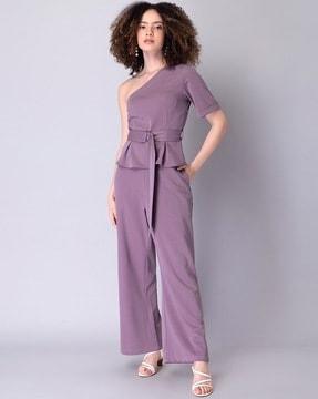 one-shoulder top with straight pants