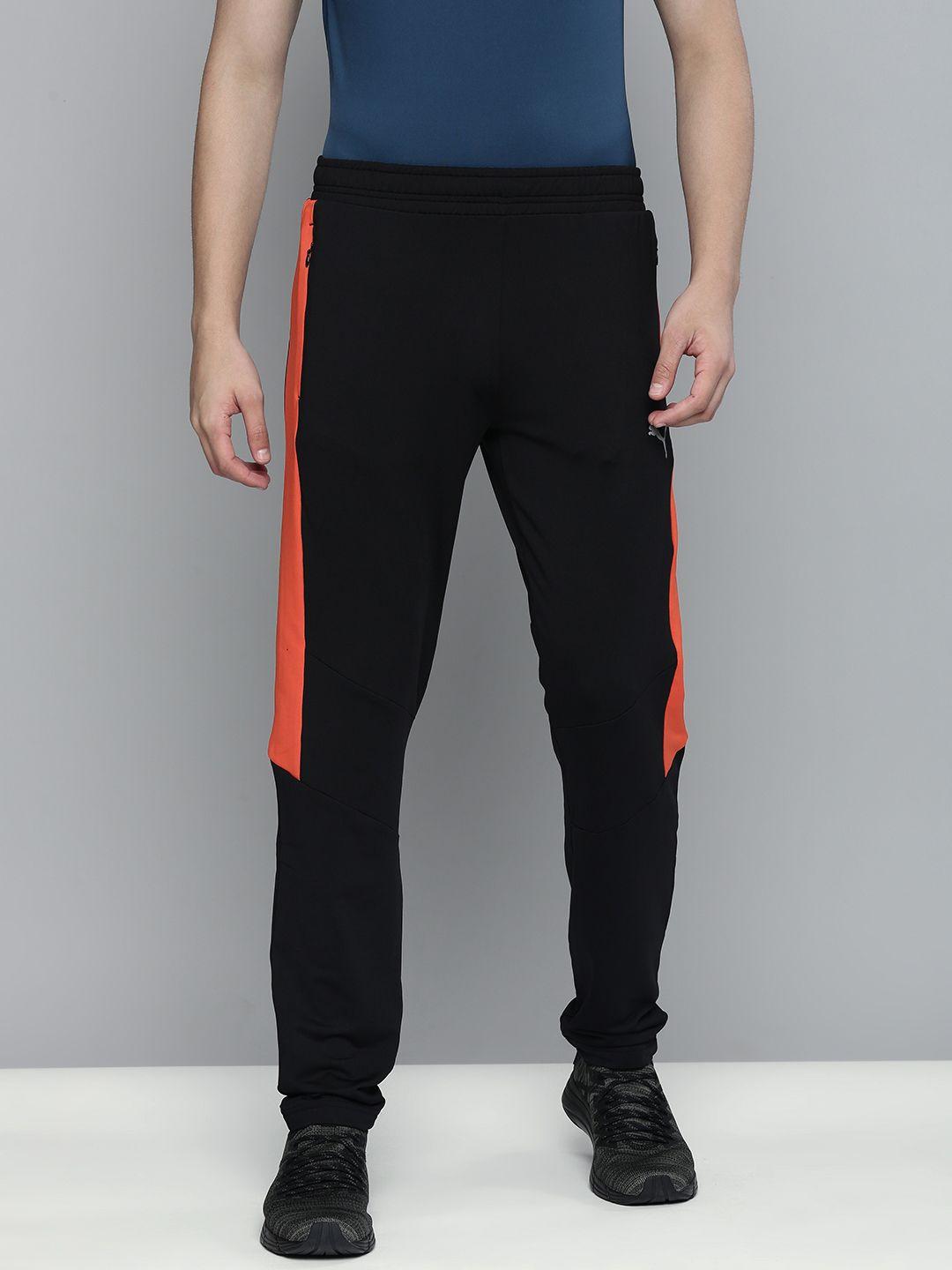 one8 x puma men black & orange colourblocked slim fit virat kohli track pants