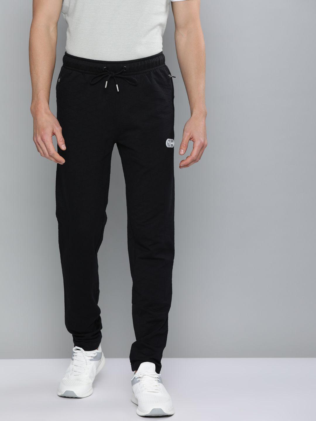 one8 x puma men black self design vk sweat pants