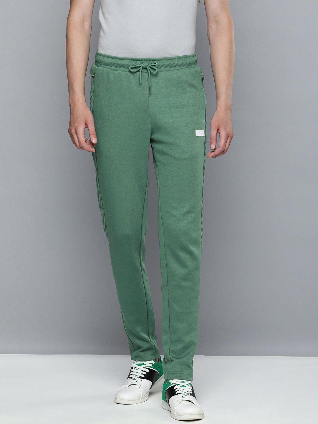 one8 x puma men green solid drycell track pants