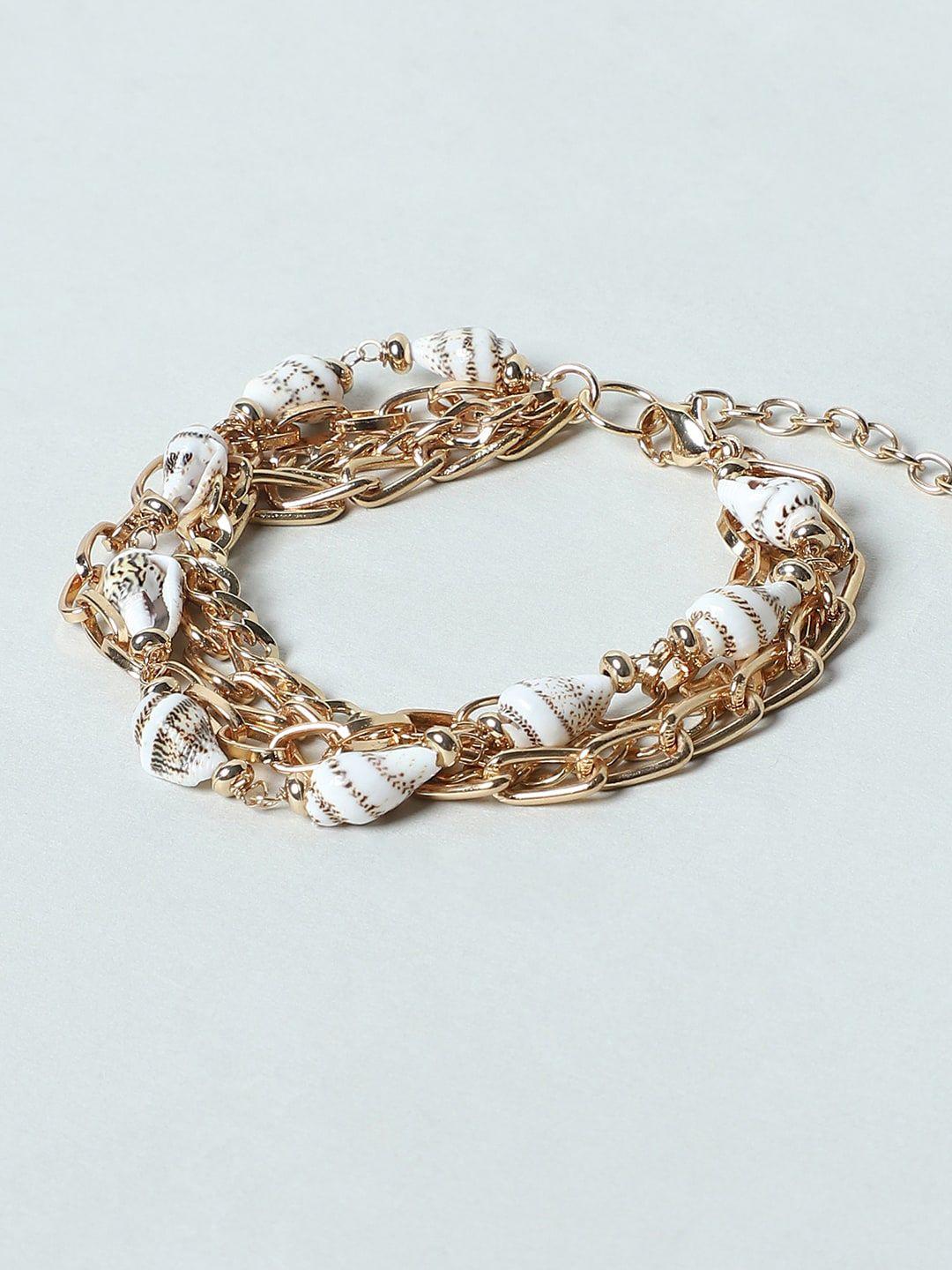 only women gold-toned bangle-style bracelet
