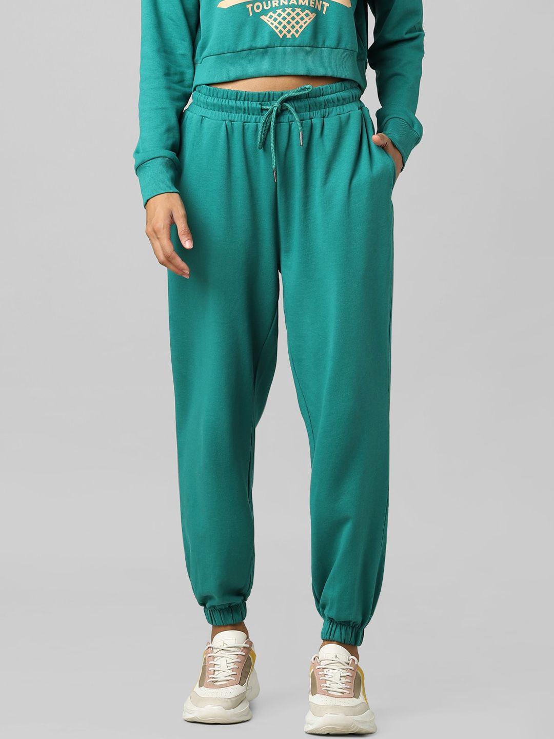 only women green solid joggers