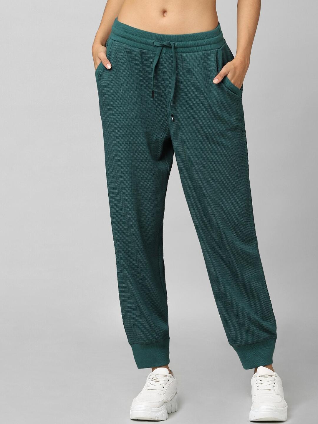 only women green textured cotton joggers