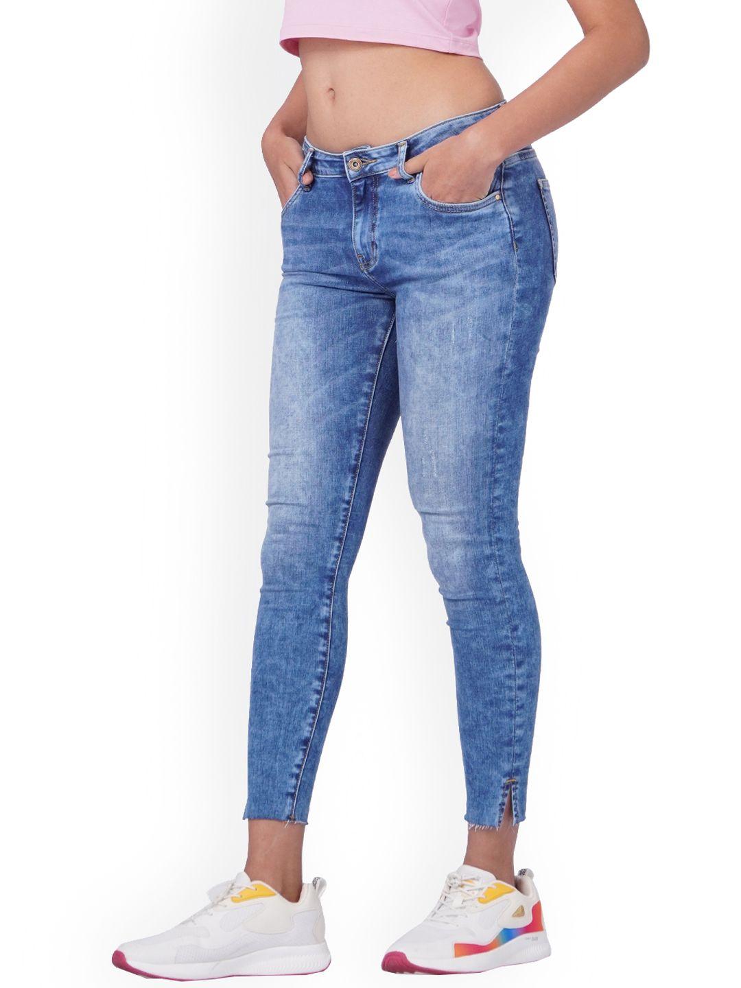 only women blue slim fit low-rise mildly distress heavy fade jeans