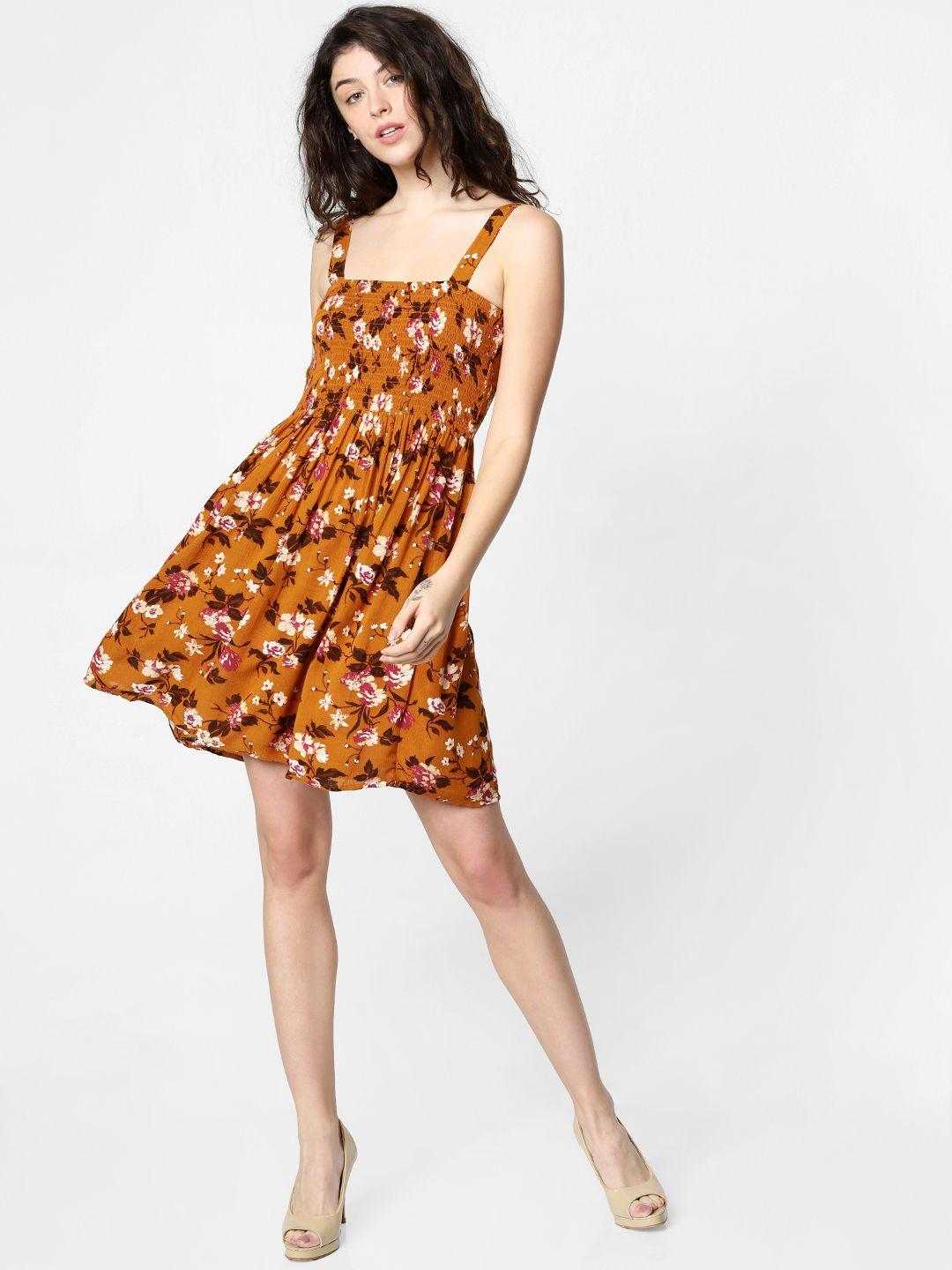 only women mustard yellow & brown printed fit and flare dress with smocked detailing