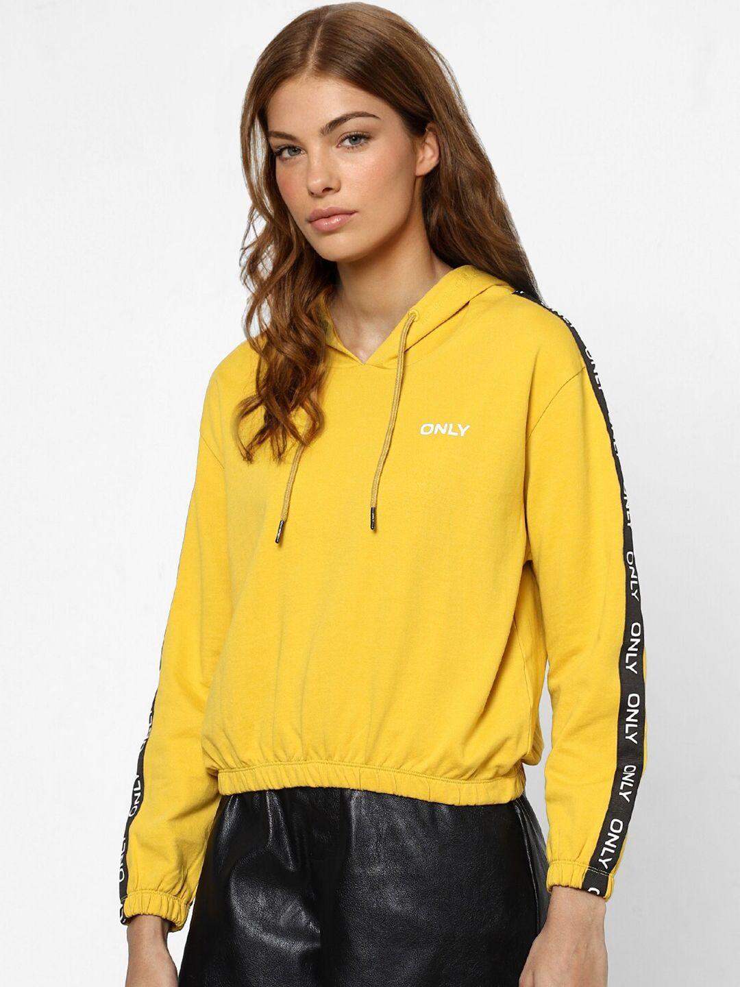 only women yellow hooded sweatshirt