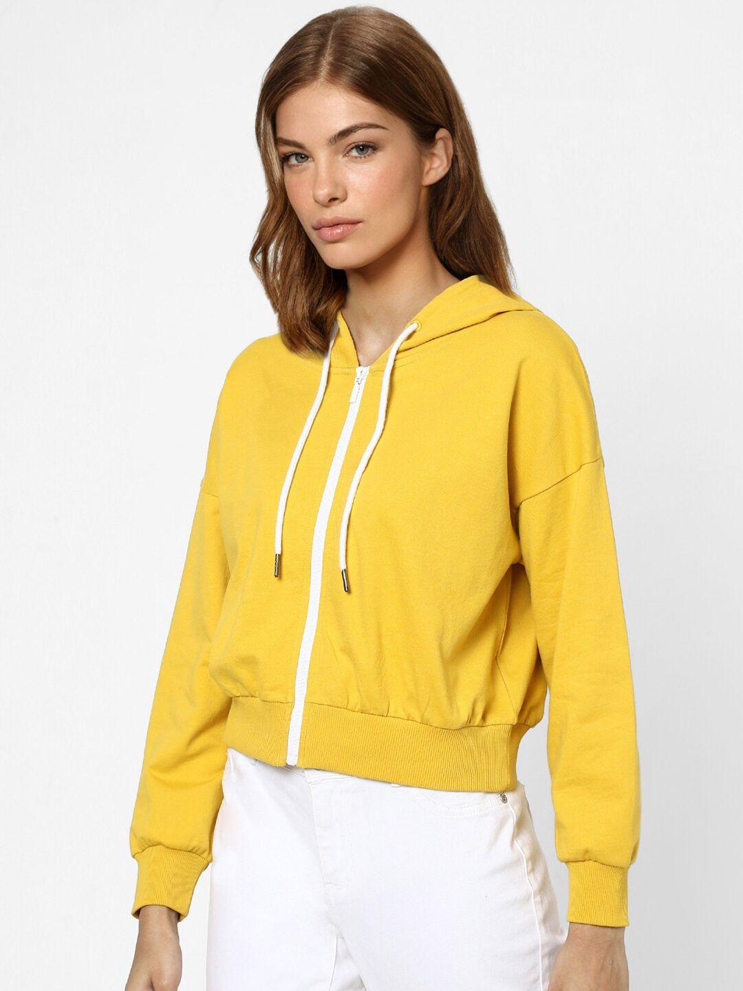 only women yellow hooded sweatshirt