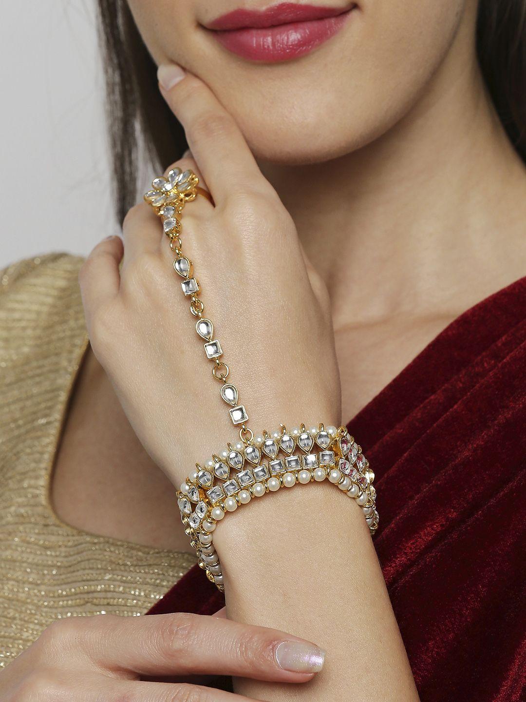 oomph women gold-toned & white kundan & pearls hathphool bracelet with ring