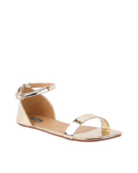 open-toe flat sandals with buckles