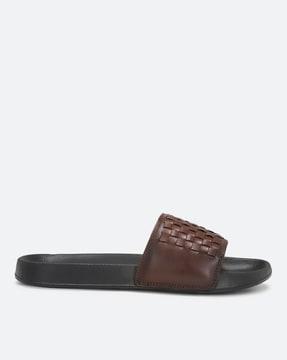 open-toe sliders with metal logo accent