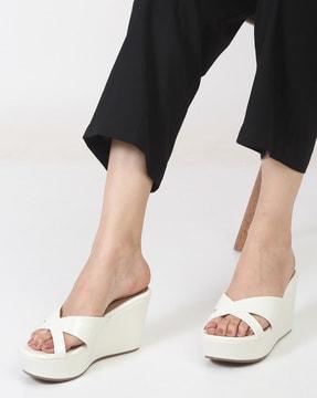 open-toe criss-cross wedges