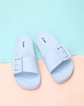 open-toe flat sandals with buckle accent