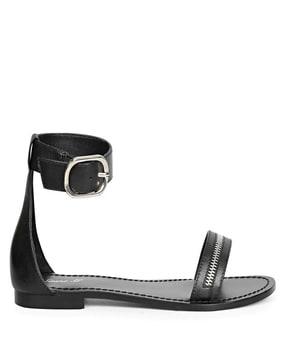 open-toe flat sandals with buckle closure