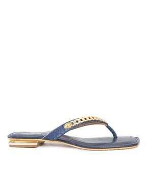 open-toe slip-on flat sandals with metal accent