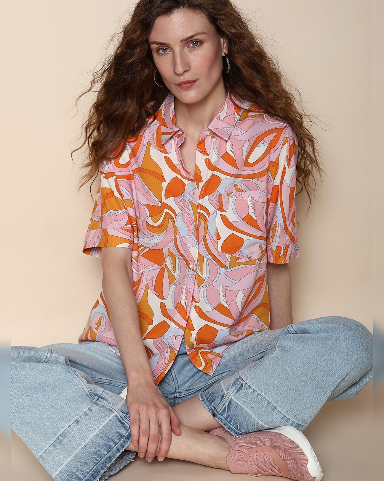 orange abstract print shirt