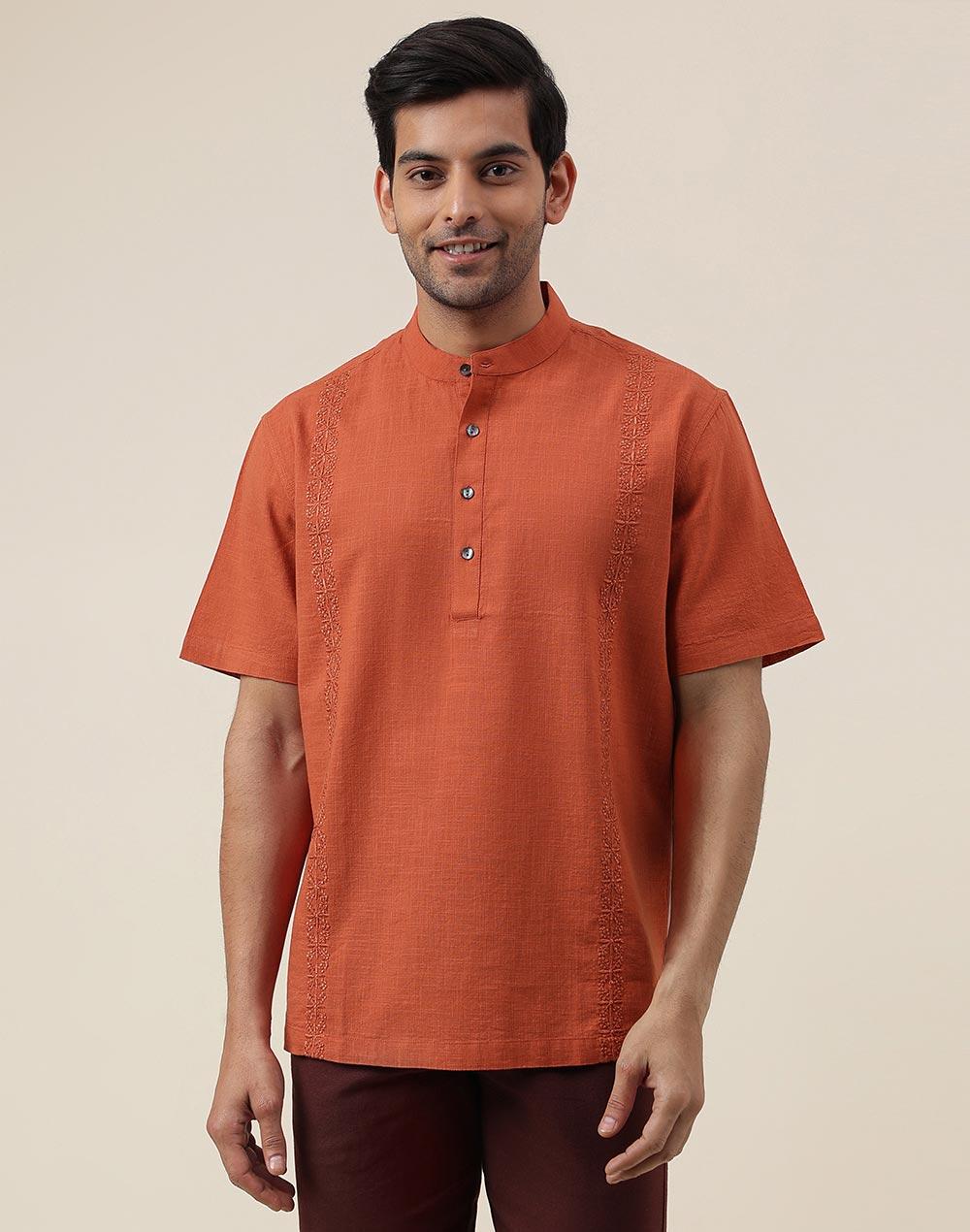 orange cotton chikankari embroidered mid placket shirt