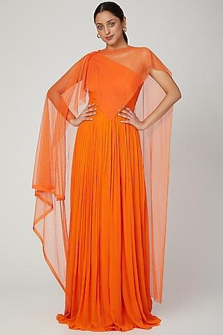 orange gown with polka lace cape