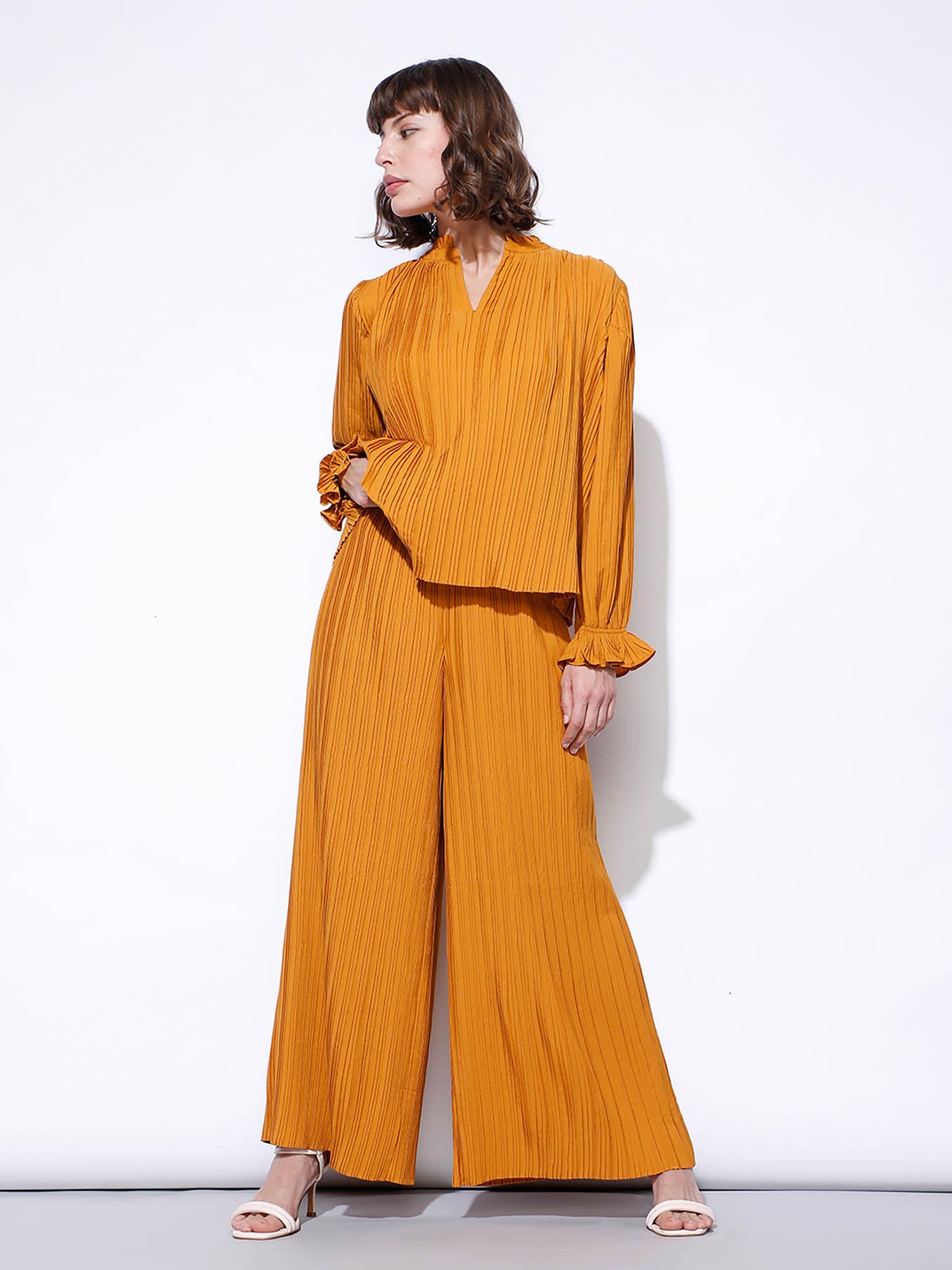 orange high rise pleated pants