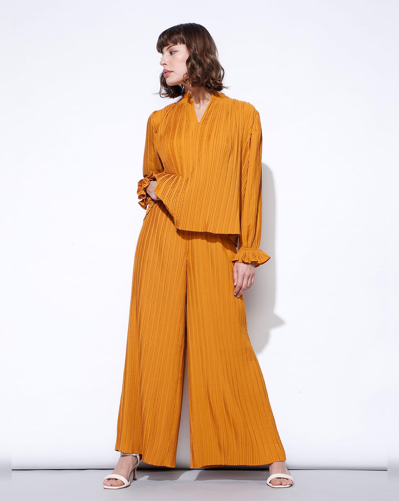 orange high rise pleated pants