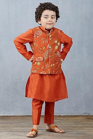 orange kurta set with bandi jacket