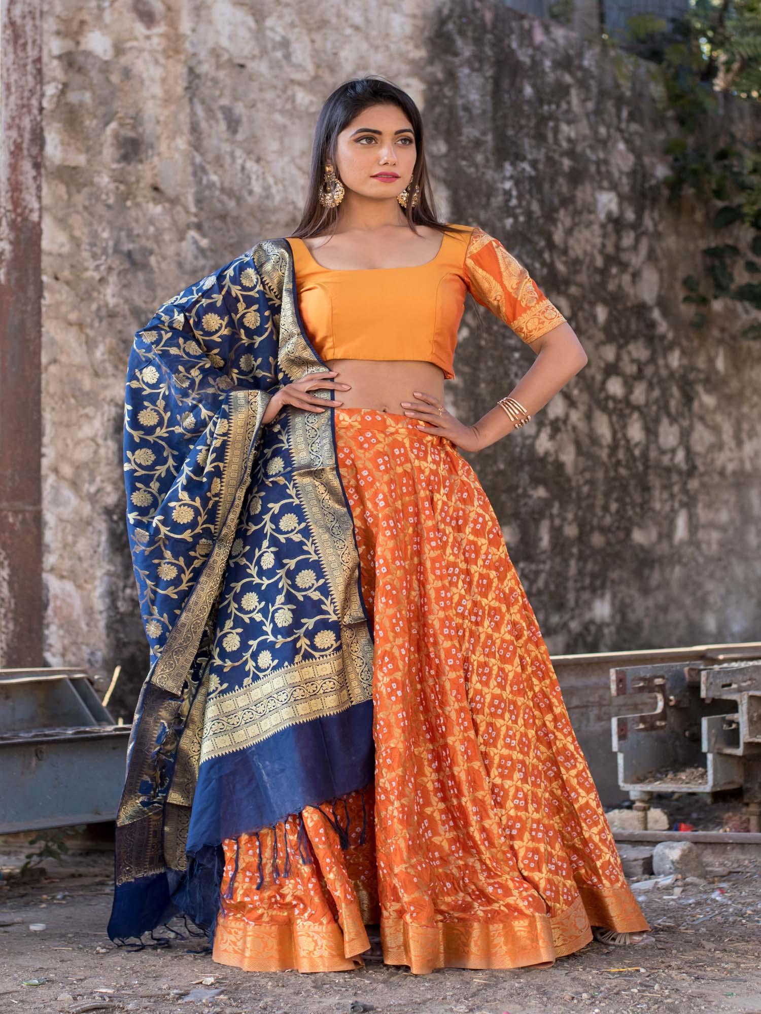 orange lehenga set with blue banarasi dupatta