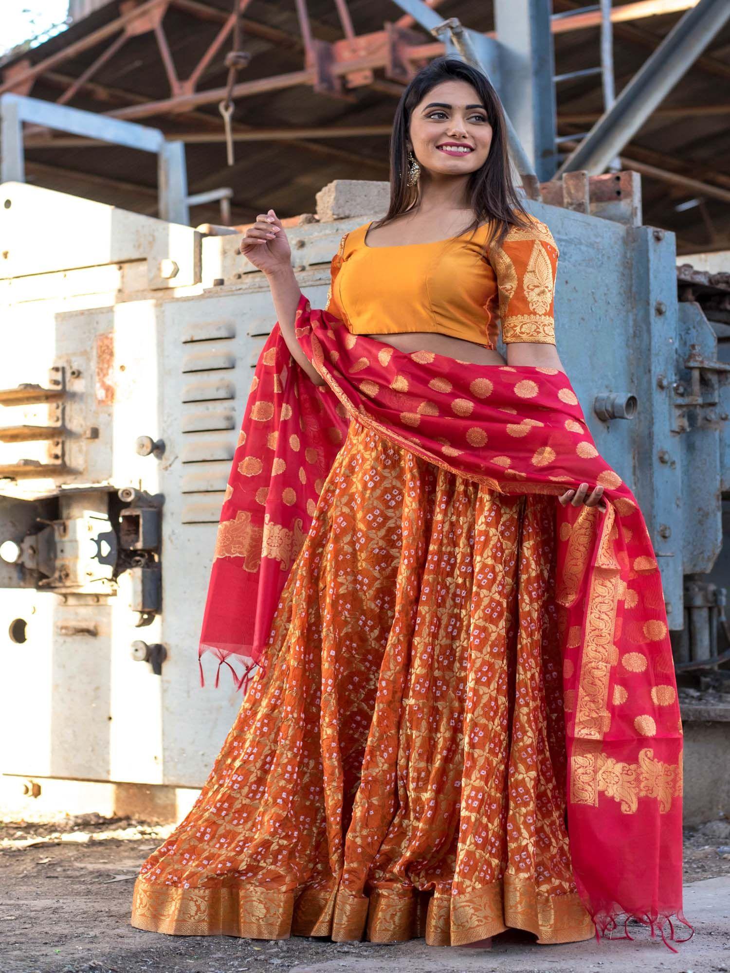 orange lehenga set with red banarasi blouse