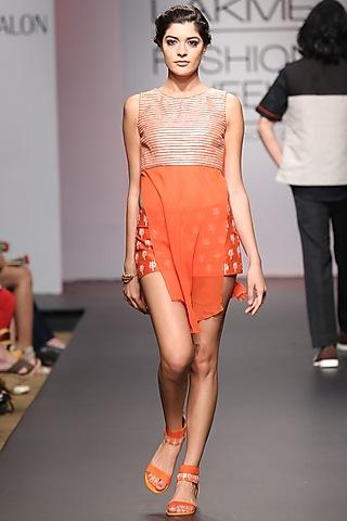 orange sheer top with trishul shorts