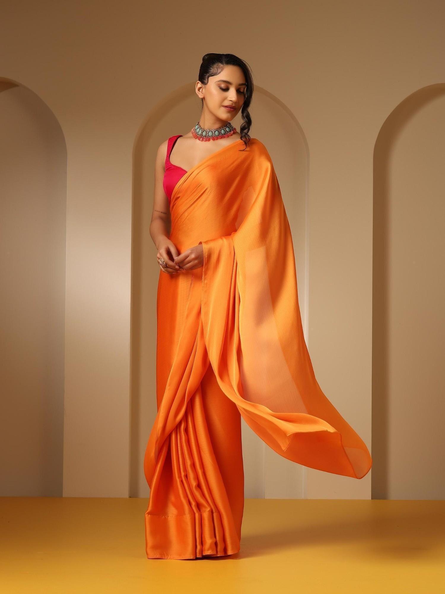 orange soft chiffon saree with fuschia fabric with unstitched blouse